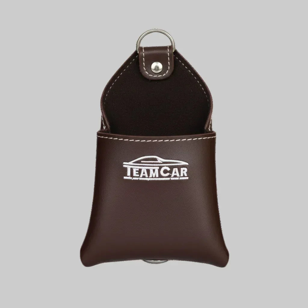 Organizator Auto Multifuncțional din Piele Maro TeamCar – Buzunar Depozitare Grilă Ventilație