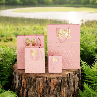 Pungi cadou cu mâner model fundă și romburi aurii 18x23x10cm - roz (set 12 buc)
